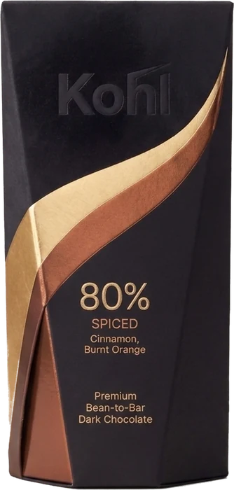 Kohl Spiced 80% carton: matte black sleeve cut by a gold and copper foil swoosh